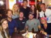 8 At Longboard Cafe, friends & family came out to hear Melissa (third from left) singing w/ Time Police & to welcome back local Zach (front in green) now serving in Coast Guard in Milwaukee, Wis.